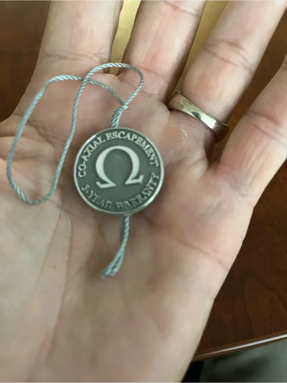 Authentic Omega Co-Axial Escapement 3-Year Warranty Hang Tag/Display Tag